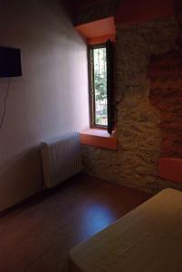 TV a/nebo společenská místnost v ubytování Hosteria Natura Plaza + 37 fotografií