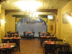 A restaurant or other place to eat at Hostal Restaurante Cornella