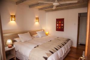Postel nebo postele na pokoji v ubytování Terrantai Lodge
