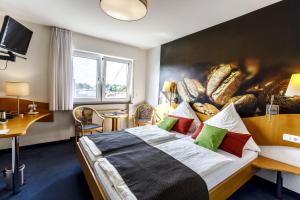 TV a/nebo společenská místnost v ubytování Hotel Rheingold