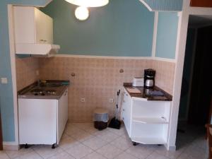 Kuchyň nebo kuchyňský kout v ubytování Apartmani Nina