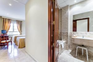 Posteľ alebo postele v izbe v ubytovaní Roma Aurea