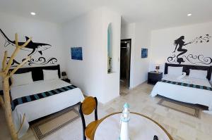 Letto o letti in una camera di Hotel Villas Tiburon Adults Only