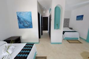 Letto o letti in una camera di Hotel Villas Tiburon Adults Only