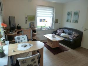 Et opholdsområde på Ferienwohnung Hitzegrad