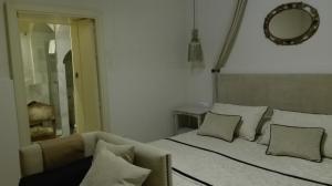 A bed or beds in a room at Estudio Bizcocheros