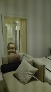 A bed or beds in a room at Estudio Bizcocheros