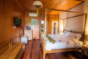 Ein Bett oder Betten in einem Zimmer der Unterkunft Pao Come Boutique House