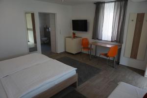 Ein Bett oder Betten in einem Zimmer der Unterkunft Gösserhof