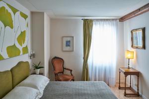 Posteľ alebo postele v izbe v ubytovaní Campiello Zen B&B