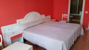A bed or beds in a room at Vivienda Perez Martin