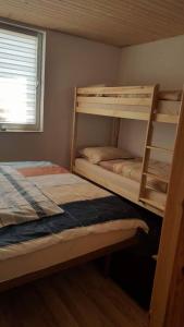Cama o camas de una habitación en Apartman Baranček