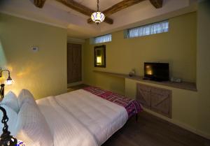 Postel nebo postele na pokoji v ubytování No12 Boutique Hotel