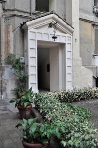 The facade or entrance of Domus Amica