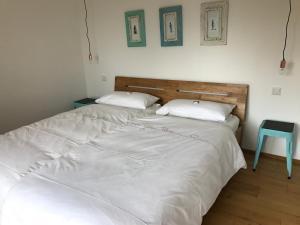 Säng eller sängar i ett rum på Ferienhaus Poppenhausen