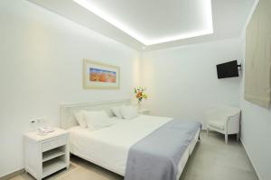 Cama ou camas em um quarto em Hotel Anna
