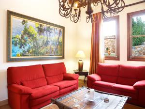 A seating area at Puig de Ros d’Alt