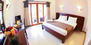 Postelja oz. postelje v sobi nastanitve Hotel Shanelo