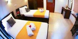 Postelja oz. postelje v sobi nastanitve Hotel Shanelo
