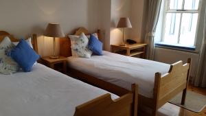 Voodi või voodid majutusasutuse The Waterfront Hotel toas