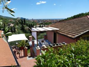 a view of a house with a roof at Belvedere Lodge in Chiavari