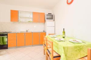 Kuchyň nebo kuchyňský kout v ubytování Apartments Zoricic