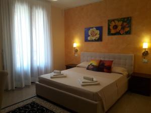 Uma cama ou camas num quarto em Vignali Residence