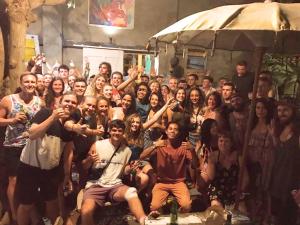 a large group of people posing for a picture at Gili La Boheme in Gili Trawangan