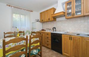 Kuchyňa alebo kuchynka v ubytovaní Apartman juričić