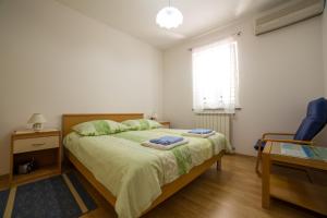 Ένα ή περισσότερα κρεβάτια σε δωμάτιο στο Apartment