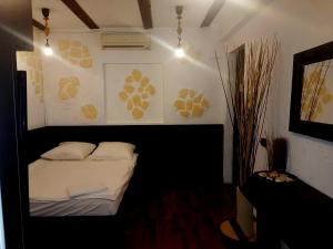 Postel nebo postele na pokoji v ubytování Mpoint Motel