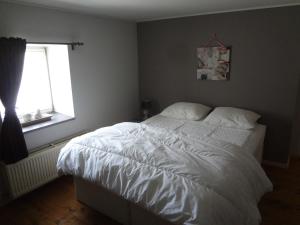 Postel nebo postele na pokoji v ubytování An Hütten