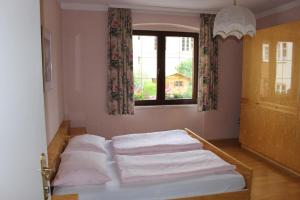 Posteľ alebo postele v izbe v ubytovaní Haus Tritscher-Gruber + 9 fotografií