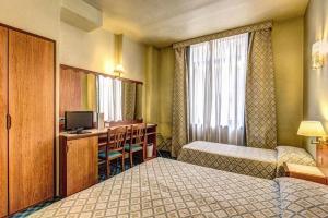 Postel nebo postele na pokoji v ubytování Hotel Europa + 37 fotografií