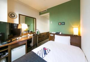 TV o dispositivi per l'intrattenimento presso APA Hotel Fujichuo