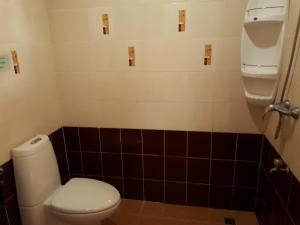 Kylpyhuone majoituspaikassa Mini Cost Apartment&Guesthouse
