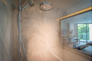Ein Badezimmer in der Unterkunft Mera Mare Pattaya