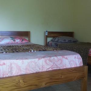 Postel nebo postele na pokoji v ubytování Join Homestay