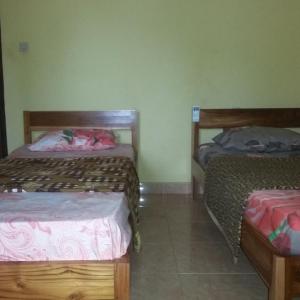 Postel nebo postele na pokoji v ubytování Join Homestay