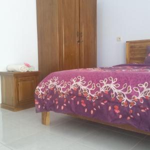 Postel nebo postele na pokoji v ubytování Join Homestay