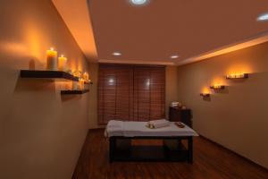 Uma cama ou camas num quarto em Ezdan Hotel Doha