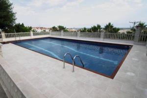 a swimming pool with a fence around it at Casa Carmen in Alcanar