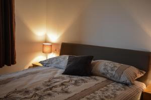 Postel nebo postele na pokoji v ubytování Farm Stay Zevnik