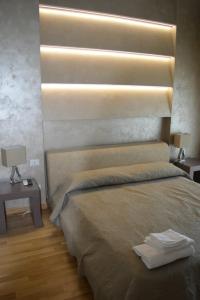 Postel nebo postele na pokoji v ubytování B&B Jolie center
