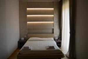 Postel nebo postele na pokoji v ubytování B&B Jolie center