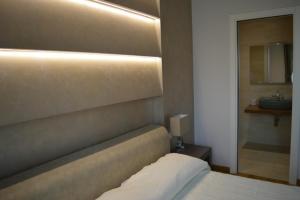 Postel nebo postele na pokoji v ubytování B&B Jolie center