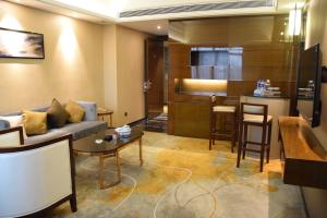 Kuchyň nebo kuchyňský kout v ubytování Ramada Foshan Hotel