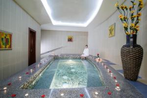 a large room with a large pool of water in it at Concorde Hotel - Fujairah in Fujairah