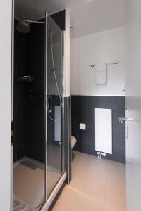 Koupelna v ubytování Hôtel Prealpina