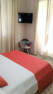 TV a/nebo společenská místnost v ubytování Casa Isabela luxury rooms